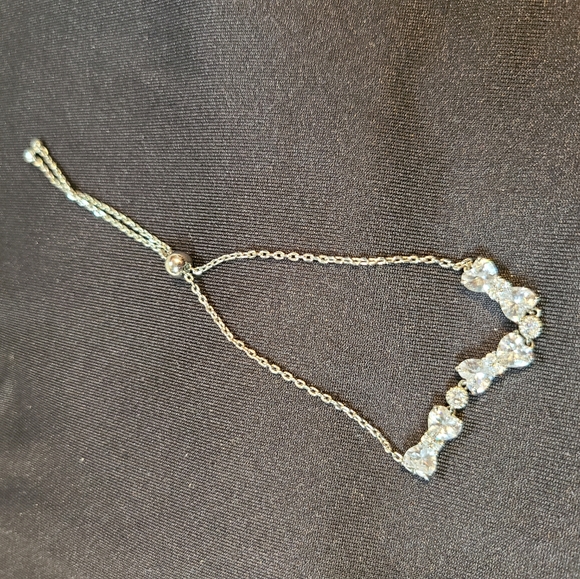 Adjustable Silver Bow-Tie Bracelet from Charmed Aroma - Picture 4 of 4